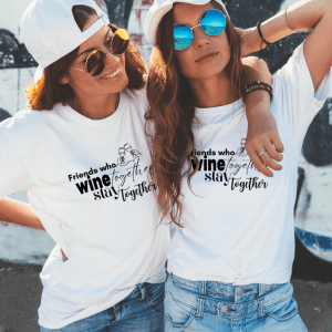 Friends saying together wearing white shirts that state friends who wine together stay together