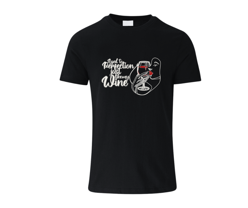 Black t-shirt on displayed on a wooden background with the graphic aged to perfection just like my wine Black Unisex