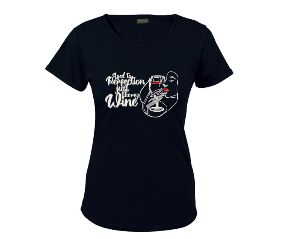 Black t-shirt on displayed on a wooden background with the graphic aged to perfection just like my wine Ladies