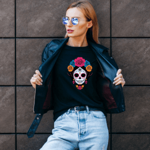female wearing a mexican skull black tee