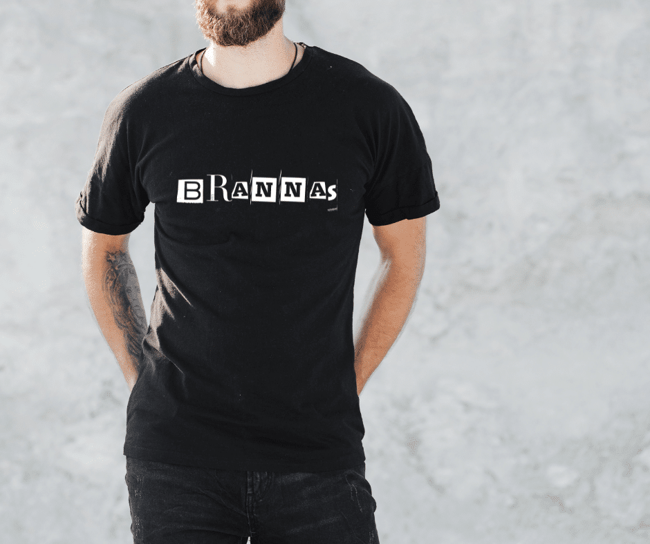 Male wearing a black graphic brannas tee